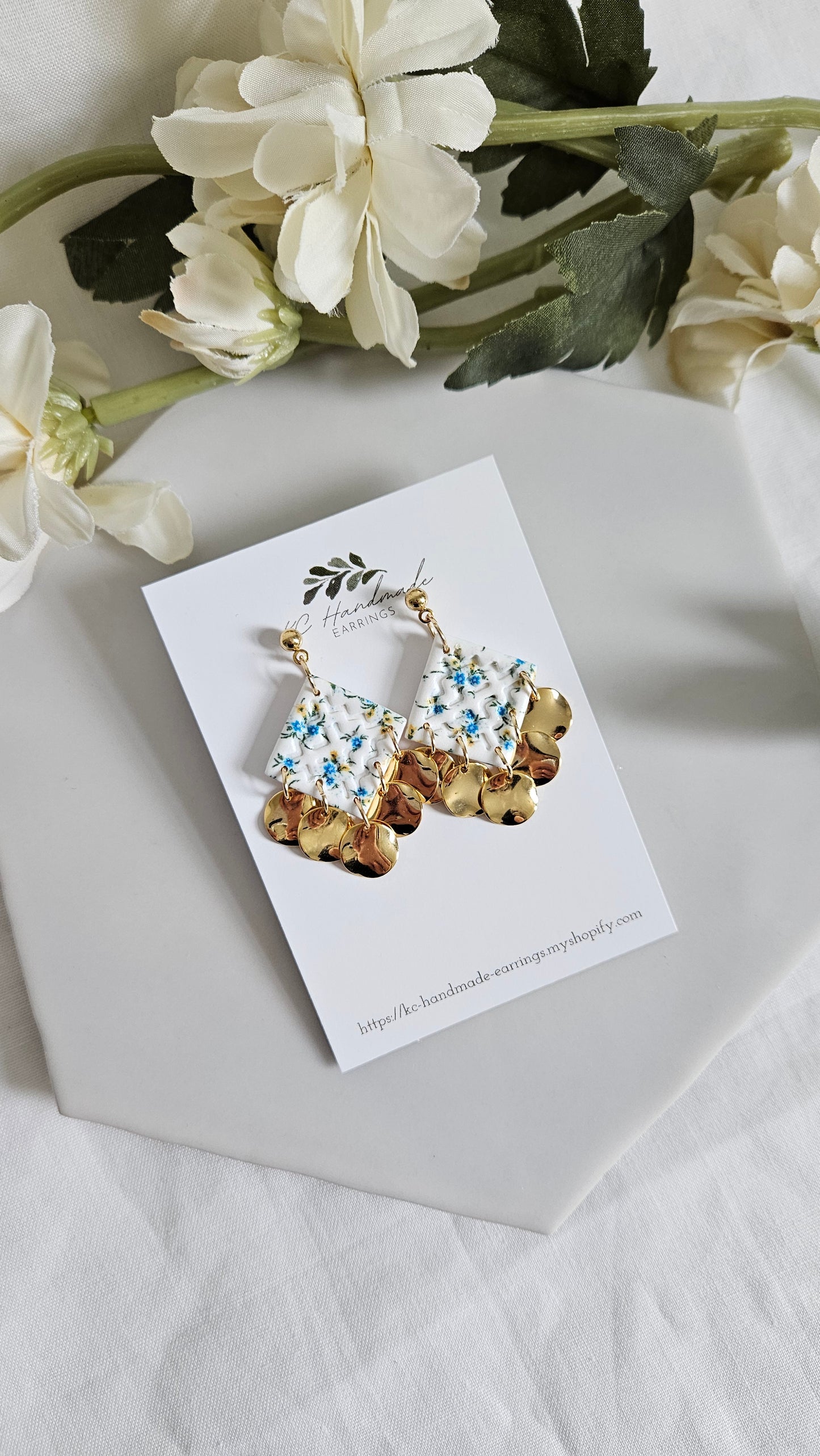 Hmong House with gold wavy charms